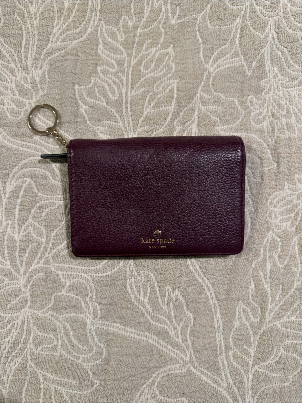 kate spade Plum Pebbled Leather Card Case with Gold Logo